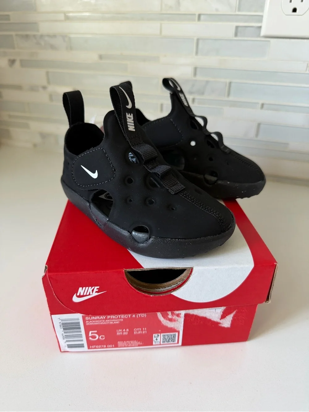 Nike Black Kids' Water Shoes with White Swoosh